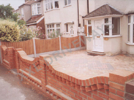 Block paved front, new wall and block paving to rear garden.